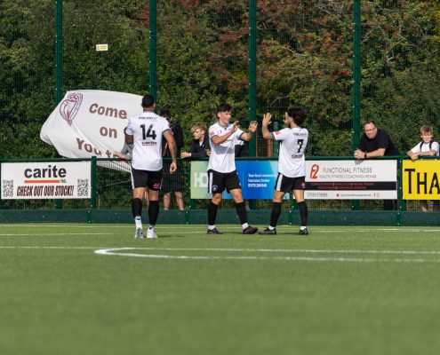 Packham celebrates his goal